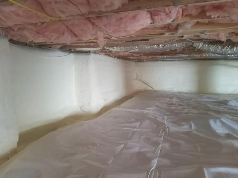 Crawl space encapsulation with closed-cell spray foam for Commercial Roof Restoration in Toronto